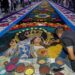 Tlaxcala: Cubren con tapetes de aserrín 7 kilómetros para la Virgen de la Caridad