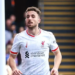 Liverpool lidera la Premier con gol de Diogo Jota, pero sufre lesión de Alisson